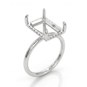 May include: A silver ring with a rectangular setting, designed to hold a gemstone. The setting is accented with small, sparkling stones. The ring's band is smooth and polished, creating a classic and elegant look. This ring is perfect for engagement or special occasions.