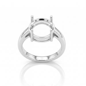 May include: A silver ring setting with a round center and four prongs. The ring has a polished finish and a classic design, perfect for a custom engagement ring or other jewelry project.