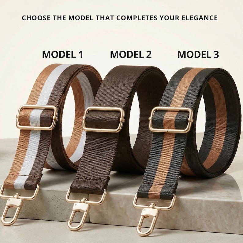 Peut inclure: Trois bandouli&egrave;res de sac &agrave; main de diff&eacute;rents mod&egrave;les. Le mod&egrave;le 1 a des rayures marron, blanches et beiges. Le mod&egrave;le 2 est marron uni. Le mod&egrave;le 3 a des rayures noires, beiges et marron. Toutes les sangles ont une quincaillerie m&eacute;tallique dor&eacute;e et le texte "CHOOSE THE MODEL THAT COMPLETES YOUR ELEGANCE".