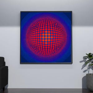 May include: A framed abstract art print with a red and orange sphere made of dots, set against a blue background. The artwork is framed in black and hangs on a white wall, adding a modern touch to the space.