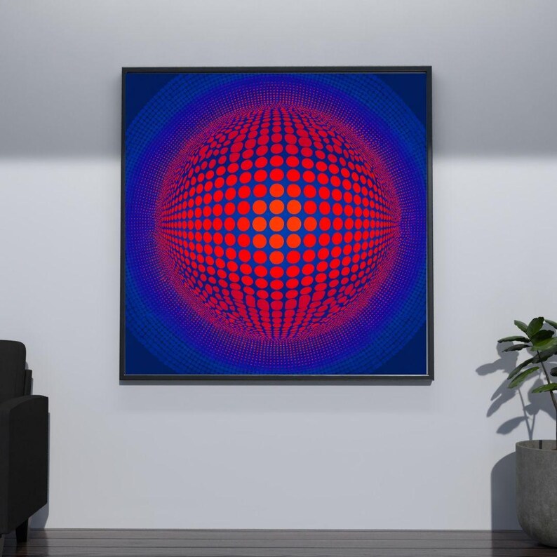 May include: A framed abstract art print with a red and orange sphere made of dots, set against a blue background. The artwork is framed in black and hangs on a white wall, adding a modern touch to the space.