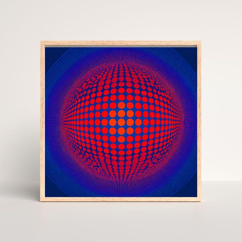 May include: Abstract art print with a red and orange sphere made of dots, set against a deep blue background. The artwork is framed in a natural wood frame. The artwork is a striking visual contrast.