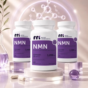May include: Three white plastic bottles of Micro Ingredients NMN dietary supplement, each featuring a purple label with the text NMN, 1,000 mg per serving, and 120 vegetarian capsules. Two white capsules lie on the surface in front of the bottles.
