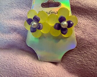 Yellow daisy earrings with purple center and faux pearls.  Stainless steel posts
