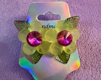 Yellow flower earrings with leaves and fuschia centers