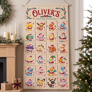 May include: A cream-colored fabric wall hanging Christmas countdown calendar featuring the text OLIVER'S CHRISTMAS COUNTDOWN at the top. It has twenty-four pockets, each printed with a different cartoon character wearing a Santa hat.