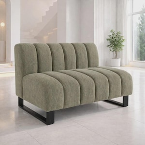 May include: A modern, olive green loveseat with a ribbed back design. The sofa features a low profile and sits on black metal legs. The neutral color and minimalist design make it suitable for various interior styles.