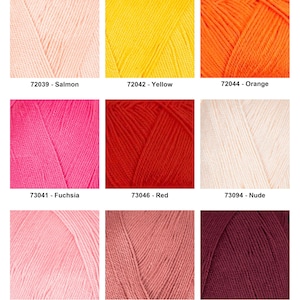 May include: A collection of nine skeins of yarn in various colors, including salmon, yellow, orange, fuchsia, red, nude, pink, coral, and bordeaux. Each skein has a corresponding number and color name printed below.