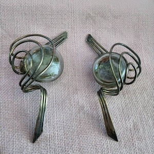 Orecchini con clips metallo argentato vetro soffiato stile modernista