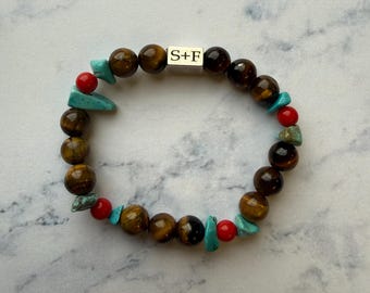 Pulsera de cuentas acrílicas rojas turquesa ojo de tigre