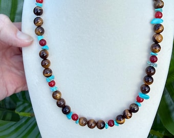 Cuentas acrílicas de ojo de tigre, turquesa y rojo con dije dorado