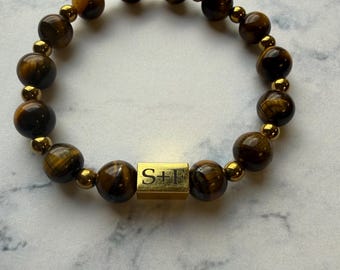 Pulsera de ojo de tigre de 8 mm con cuentas de hematita dorada.