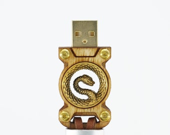 Wooden 16/32/64/128/256/512GB USB 3.1 Flash drive with gold tone Snake Ear Tunnels insert and genuine leather strap.  Low-profile design.