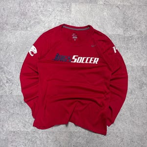 Maillot de football à manches longues Nike Dri-FIT Jags rouge, taille M, pour femme.