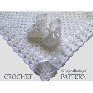 May include: White crochet baby blanket with a scalloped edge and white satin ribbon accents. The blanket is accompanied by two white crocheted baby booties with white satin ribbon bows. The text "CROCHET PATTERN" is visible in the bottom right corner of the image.