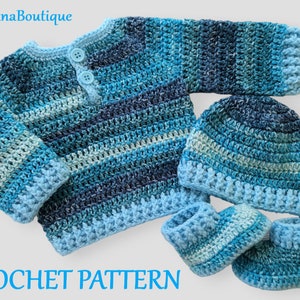 May include: A handmade crochet baby set in shades of blue, including a sweater with two buttons, a beanie, and a pair of booties. The set is made with a striped pattern and features the text "CROCHET PATTERN". The brand name "TatjanaBoutique" is also visible.