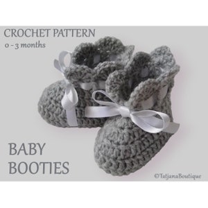 May include: A pair of gray crochet baby booties with white ribbon ties. The booties have a scalloped edge and are labeled as a crochet pattern for 0-3 months. The text "BABY BOOTIES" is also displayed.