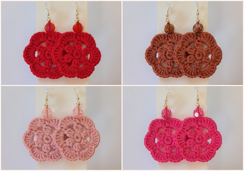 May include: Four pairs of crocheted flower earrings with gold hooks and glass beads. The earrings are in red, brown, pink, and fuchsia.