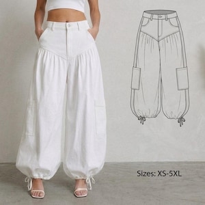 Puede incluir: Pantalones blancos de cintura alta con un diseño único, con cintura fruncida y bolsillos cargo. Los pantalones tienen forma de globo en los tobillos, con detalles de lazo. Un dibujo lineal de los pantalones se muestra a la derecha, con el texto "Tallas: XS-5XL".