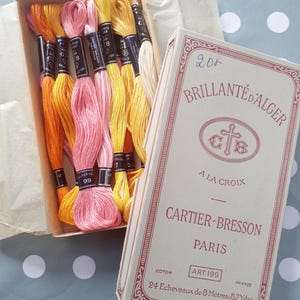 C B Cartier Bresson, Paris, Vintage haberdashery box containing 12 unused Brillante D'alger threads, stranded embroidery thread