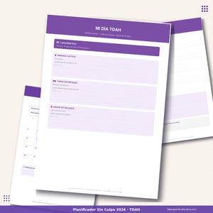 May include: A stack of white paper planner sheets with purple accents. The top sheet has the title "MI D&Iacute;A TDAH" and sections for daily planning. The bottom of the sheet reads "Planificador Sin Culpa 2026 &bull; TDAH".