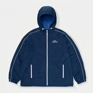 May include: A navy blue windbreaker jacket with a hood, featuring a white front zipper, white piping along the sleeves, and two side pockets. The text KEEP SWIMMING is printed in white on the upper left chest, and the interior lining is bright blue.