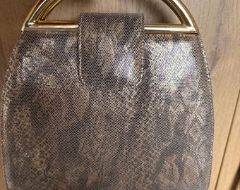 Beautiful original 1960's Stewart Weitzman for Russell & Bromley beautiful snakeskin bag with gold frame