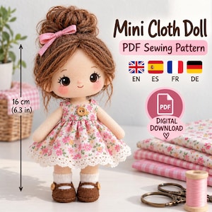 May include: A cloth doll with brown yarn hair in a bun, a pink hair bow, and a floral dress with a wooden button. The doll is 16 cm tall. Text reads Mini Cloth Doll, PDF Sewing Pattern, Digital Download, and language codes EN, ES, FR, DE.