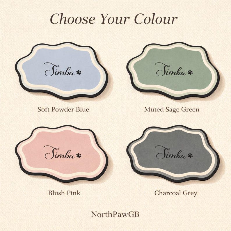 May include: Four pet name tags in pastel colours: soft powder blue, muted sage green, blush pink, and charcoal grey. Each tag displays the name "Simba" in script with a paw print, and the text "Choose Your Colour".