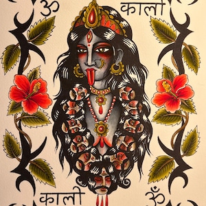May include: Illustration of the Hindu goddess Kali with a dark complexion, red tongue, and multiple heads. The artwork features red hibiscus flowers, the word "Kali" in Hindi, and the Om symbol. The image is framed with black decorative elements.