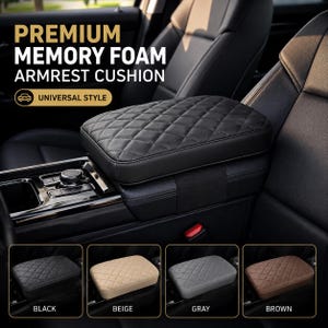 May include: A black memory foam armrest cushion with a quilted diamond pattern, installed on a car center console. The text reads PREMIUM MEMORY FOAM ARMREST CUSHION UNIVERSAL STYLE. Four color options are shown: black, beige, gray, and brown.