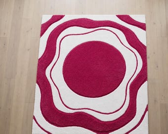 Alfombra abstracta de lana rosa hecha a mano, alfombra moderna de círculos ondulados.