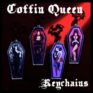 May include: Four coffin-shaped keychains with images of women inside. The keychains have a silver border and a loop at the top. The background is red with the words "Coffin Queen" and "Keychains" in white script.
