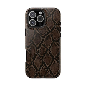 May include: A smartphone case featuring a dark brown and black snakeskin pattern. The case has a rectangular shape with rounded corners and a cutout in the upper left corner to accommodate a triple-lens camera system and a flash component.