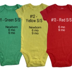 May include: Three baby onesies in green, yellow, and red. Each onesie has a number, colour, and size printed on the front. The onesies are available in newborn, 6 months, and 9 months sizes.