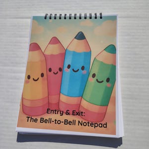 May include: A spiral-bound notepad with a colorful pencil design. The cover features four smiling cartoon pencils in yellow, pink, blue, and green. Text on the cover reads "Entry & Exit: The Bell-to-Bell Notepad."