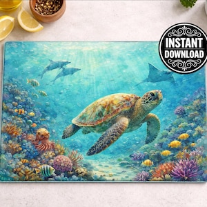 May include: A rectangular glass cutting board featuring an underwater scene with a sea turtle, fish, and coral. The design is in shades of blue, green, and yellow. The words "INSTANT DOWNLOAD" are in a black circle.