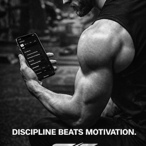 May include: Monochrome image of a person using a smartphone, likely a fitness app. The text "DISCIPLINE BEATS MOTIVATION" and the Gainshift logo are visible. The image has a fitness and training theme.