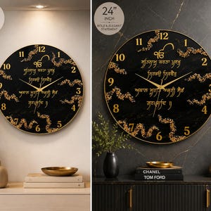 May include: Two round wall clocks with black marble-patterned faces, gold-coloured numerals, and gold hands. The clocks feature gold-coloured decorative accents and Gurmukhi script. One clock is 16 inches in diameter, and the other is 24 inches.