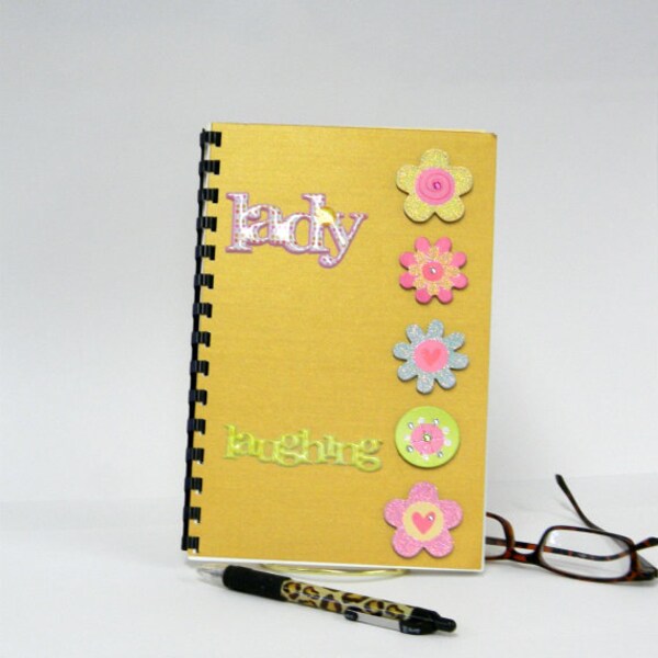 Login and password notebook with laughing lady and floral decal design