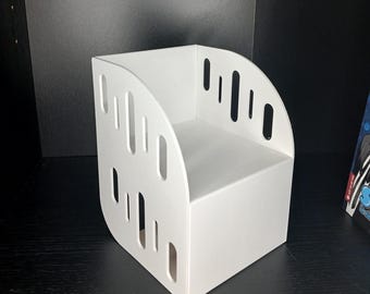 Soporte modular para libros de manga, impreso en 3D: infinitamente ampliable y combinable con paneles laterales.