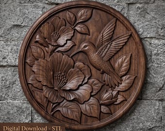 May include: A circular dark brown wood carving featuring a hummingbird in flight approaching two large blooming flowers with detailed petals and leaves. The piece includes the text Digital Download - STL at the bottom of the frame.