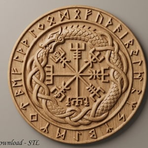 May include: A circular light brown wooden plaque featuring a carved Ouroboros snake encircling a Vegvisir symbol. The outer edge of the plaque is decorated with a ring of carved runic characters. The surface displays a natural wood grain texture.