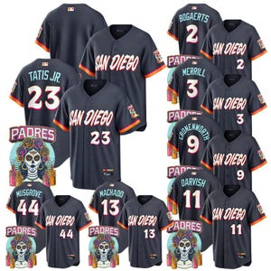 May include: Navy blue San Diego Padres baseball shirts with player names and numbers, such as Tatis Jr. 23, Bogarts 2, and Machado 13. The shirts have white script team names and colourful accents.
