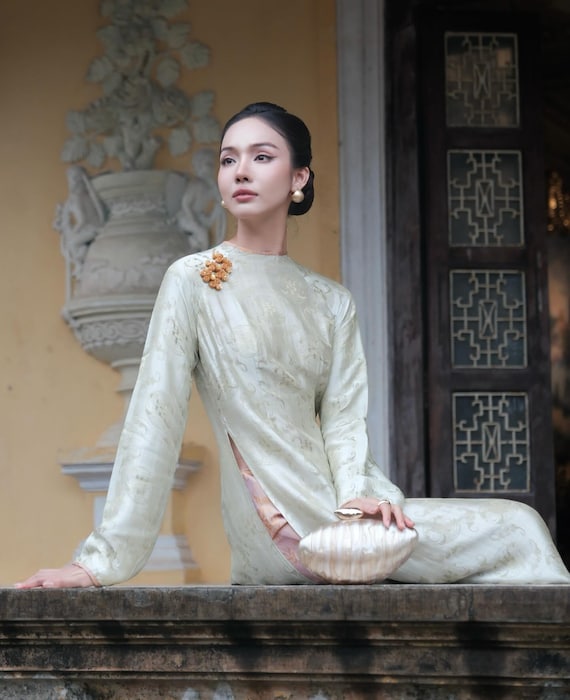 Lustrous Pistachio Silk Ao Dai: Hand-Tailored Vietnamese Wedding Gown, Peach Lining