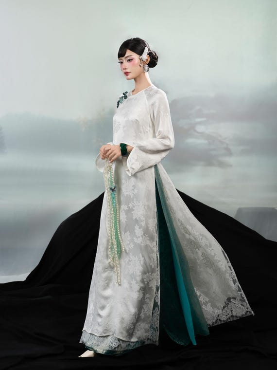 White Floral Jacquard Silk Ao Dai – Lace Hem, Emerald Frog Closures Vietnamese Dress
