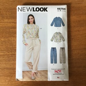 May include: A sewing pattern for a blouse and trousers. The pattern includes two different styles of blouses and two different styles of trousers. The pattern is for sizes UK 10-18. The pattern is produced in association with Sew Magazine.
