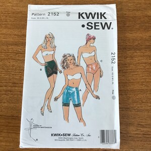 May include: A vintage Kwik Sew sewing pattern, pattern number 2152, featuring illustrations of lingerie designs. The pattern includes sizes XS to XL. The cover displays three illustrated figures wearing different lingerie styles. The pattern is designed by Kerstin Martensson.