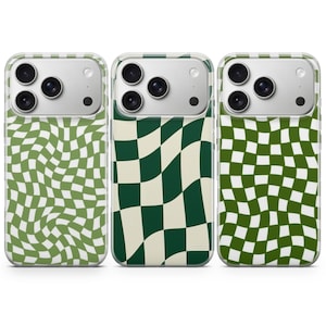 May include: Three phone cases with a clear border and a green and white checkered pattern. The patterns vary, with one having a wavy design, another a classic checkerboard, and the third a more square pattern. The phone cases are designed to fit a smartphone.