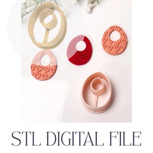 May include: A set of three ceramic nesting bowls in shades of blue, green, and white. The bowls feature a speckled glaze and a simple, modern design. The largest bowl measures approximately 6 inches in diameter.